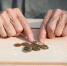 hands-elderly-man-holding-coins-concept-lack-money-poor-small-pension-old-people-image_253081-608 - ЗА Новомосковск